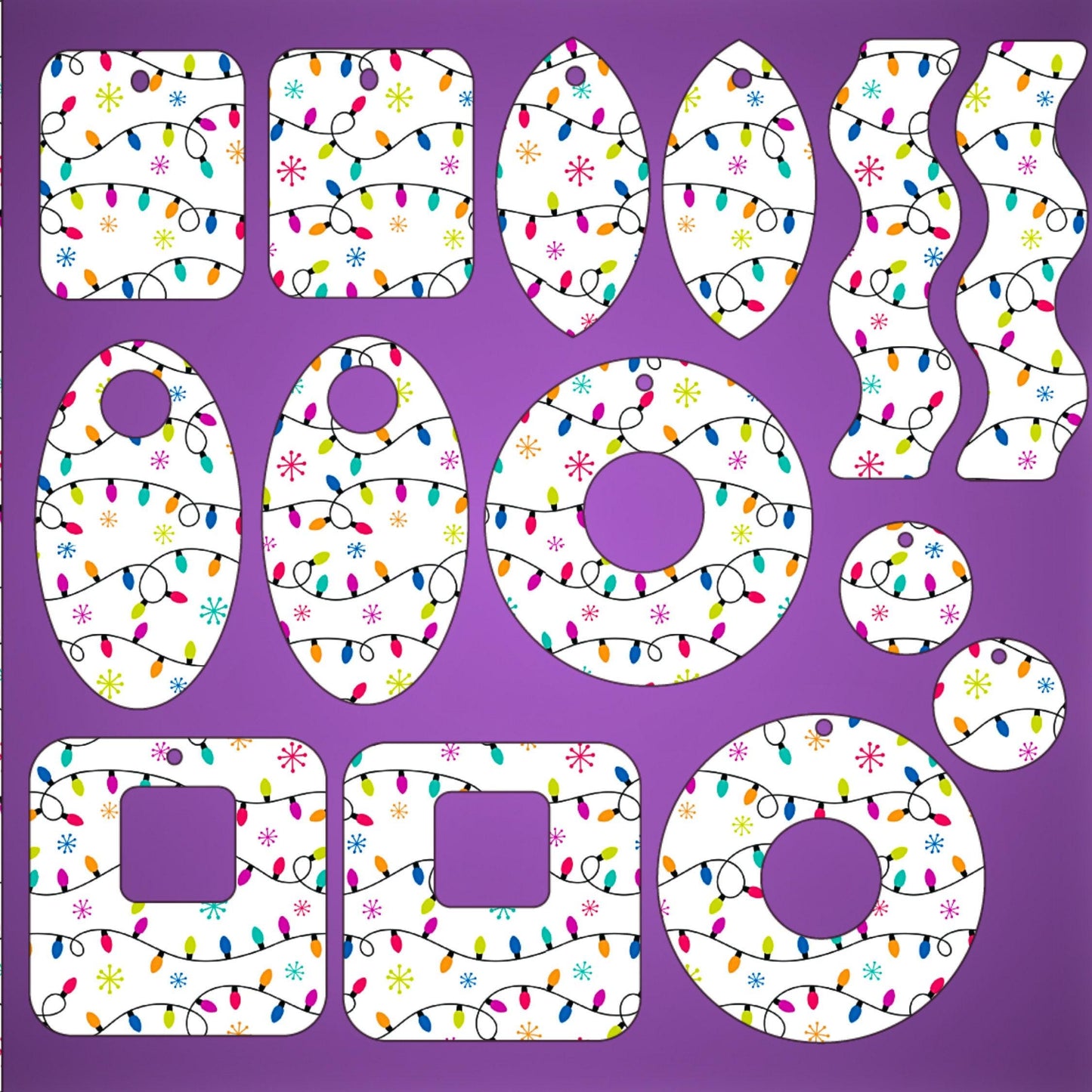 a set of cut out letters and numbers with christmas lights on them