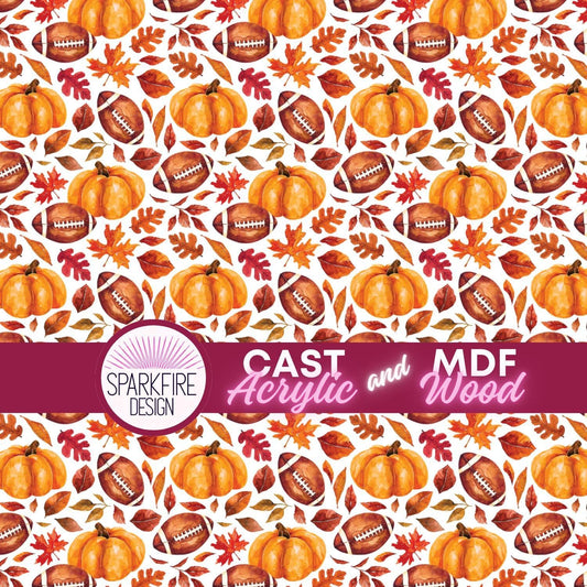 patterned acrylic  featuring orange pumpkins, brown footballs, and autumn leaves on a white background. patterned acrylic for laser cutting.  The acrylic is white cast acrylic.  Patternply acrylic.