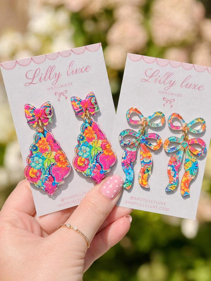 Earrings made with patterned acrylic.