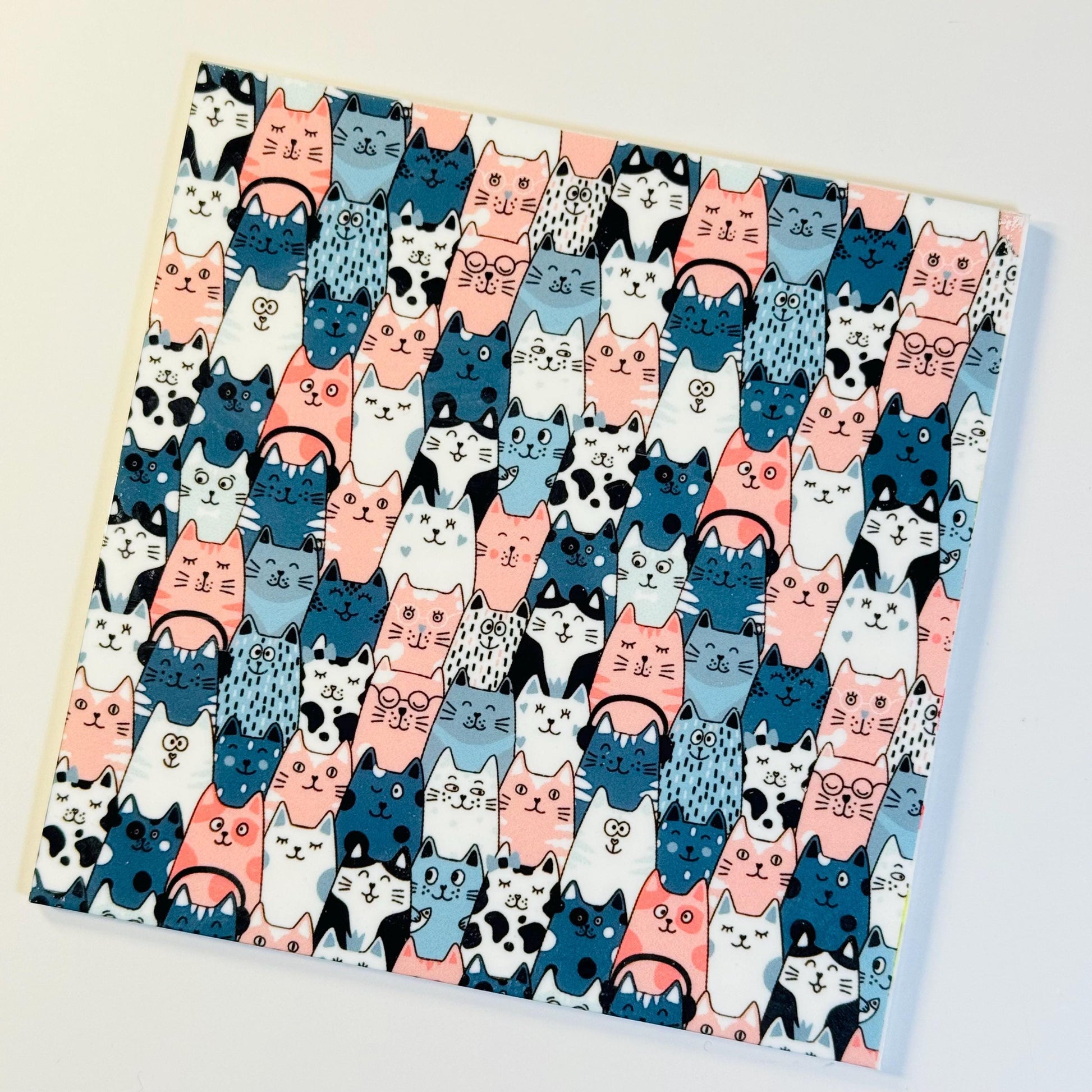 a picture of a bunch of cats on a sheet of paper