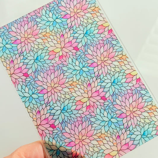 a vibrant and colorful pattern of flowers, with a variety of shades and hues creating a visually striking and lively design.