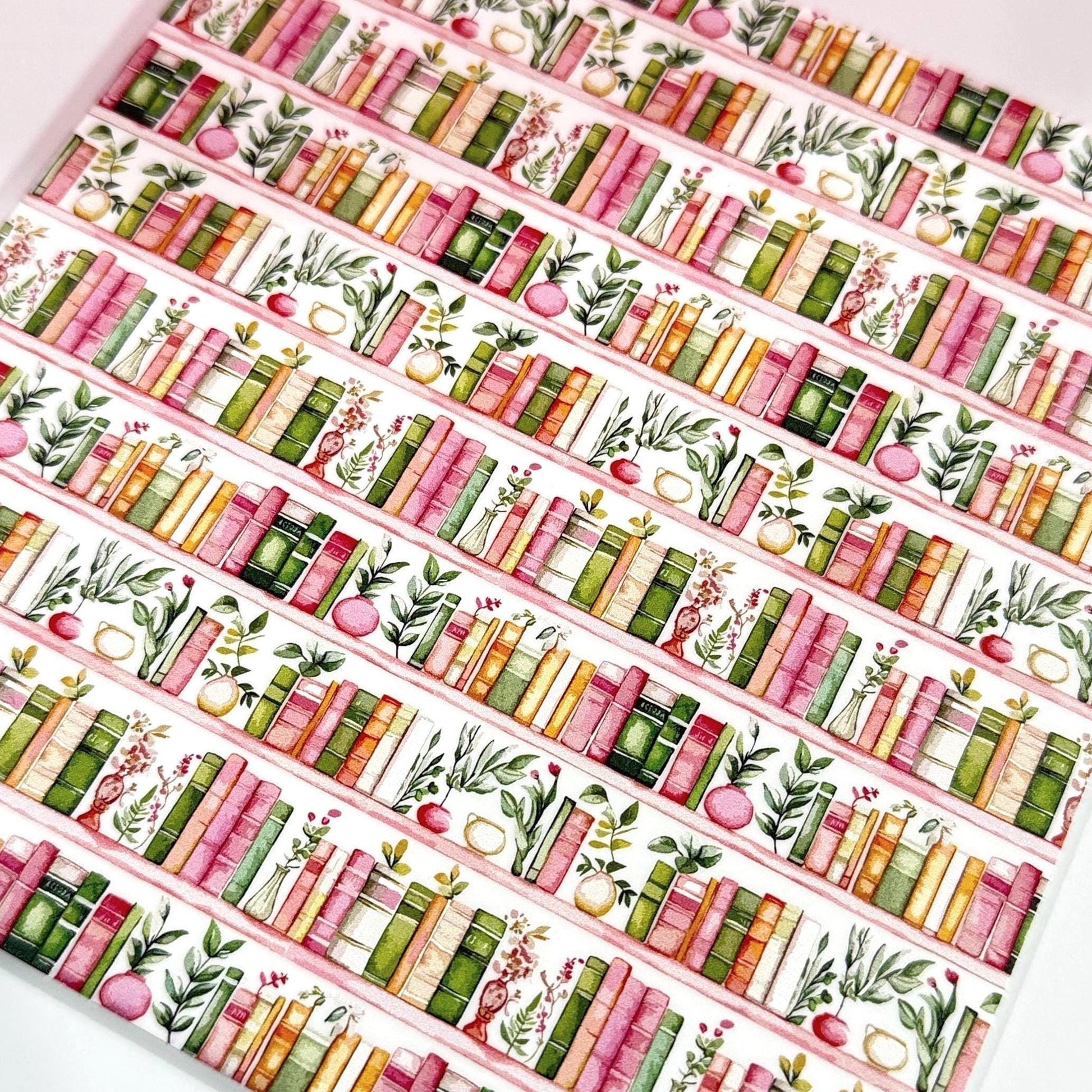 Watercolor pattern of books on white acrylic for laser cutting
