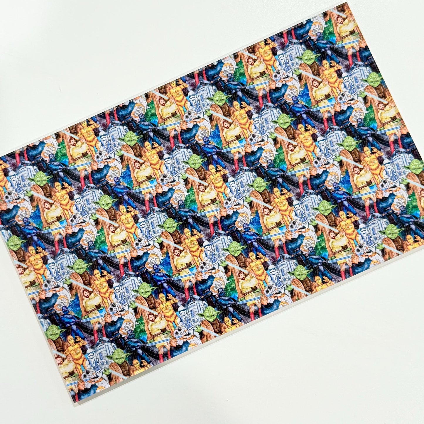 The image is a repeating pattern of various colorful and stylized figures, including people, animals, and abstract shapes, arranged in a diagonal pattern.