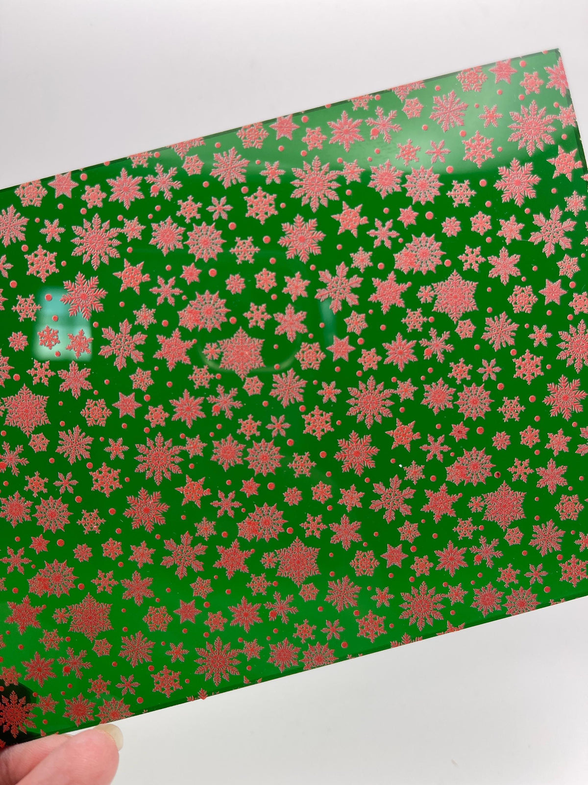 Red Snowflakes on Transparent Green Acrylic  for Lasers, Patterned Acrylic, Acrylic for Jewelry and Cup Toppers
